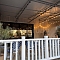 Отделка стены ДПК на открытой террасе кофейни